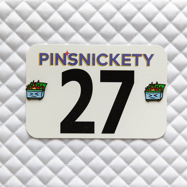 Pinsnickety Dumpster Fire horse show number pins on a saddle pad