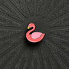 pinsnickety flamingo horse show number pin alone on a black background