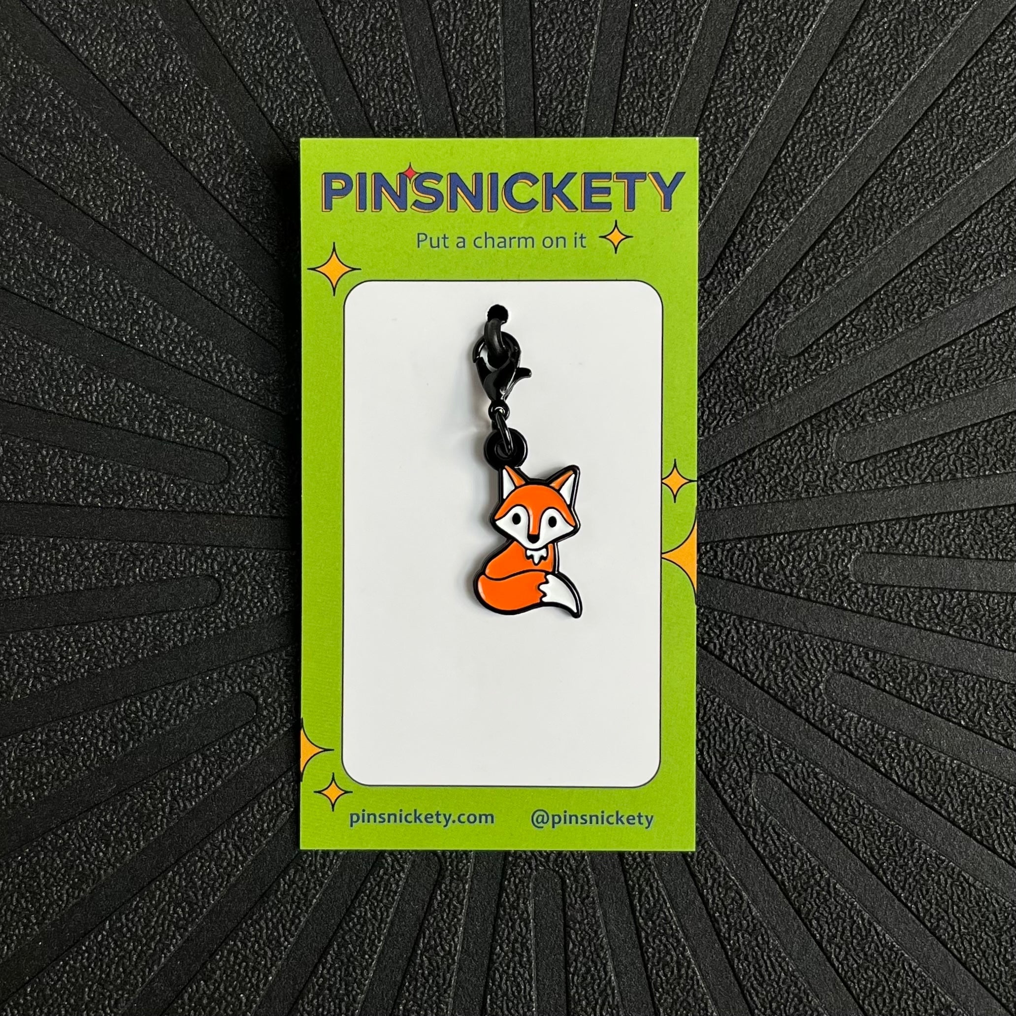 pinsnickety fox braid and bridle charm on a black background