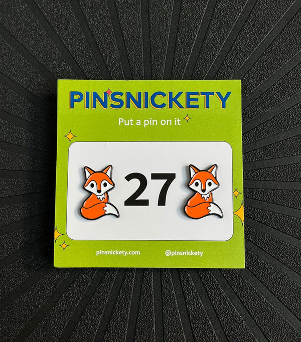 pinsnickety fox horse show number pins  on a black background