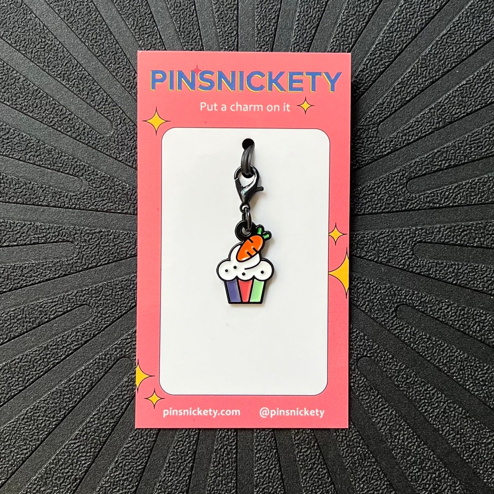 pinsnickety cupcake braid and bridle charm on a black background