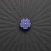 pinsnickety purple poppy horse show number pin on a black background