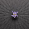 Pinsnickety Skull horse show number pin on a black background